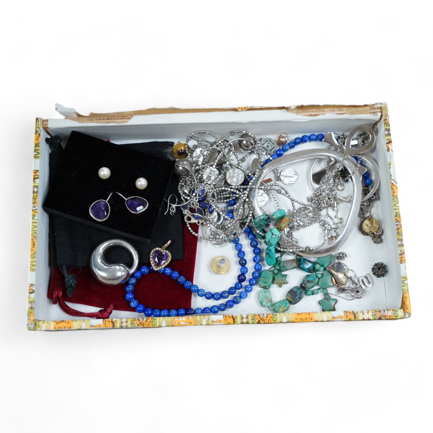 Assorted silver and costume jewellery including a Tiffany Elsa Peretti round circle pendant, 34mm, a lapis lazuli necklace and an amethyst heart pendant. Condition - fair